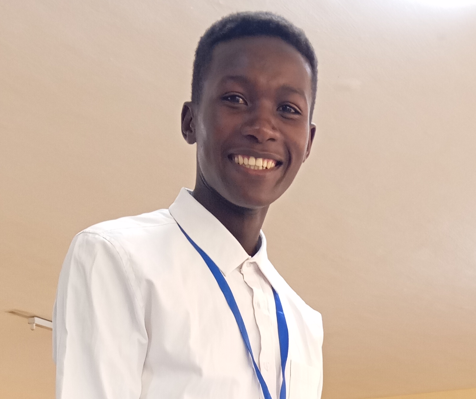 Portrait of Joseck Ombati from GreenTech Solutions giving a positive website development testimonial